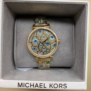 Gold Peacock MICHAEL KORS watch.
